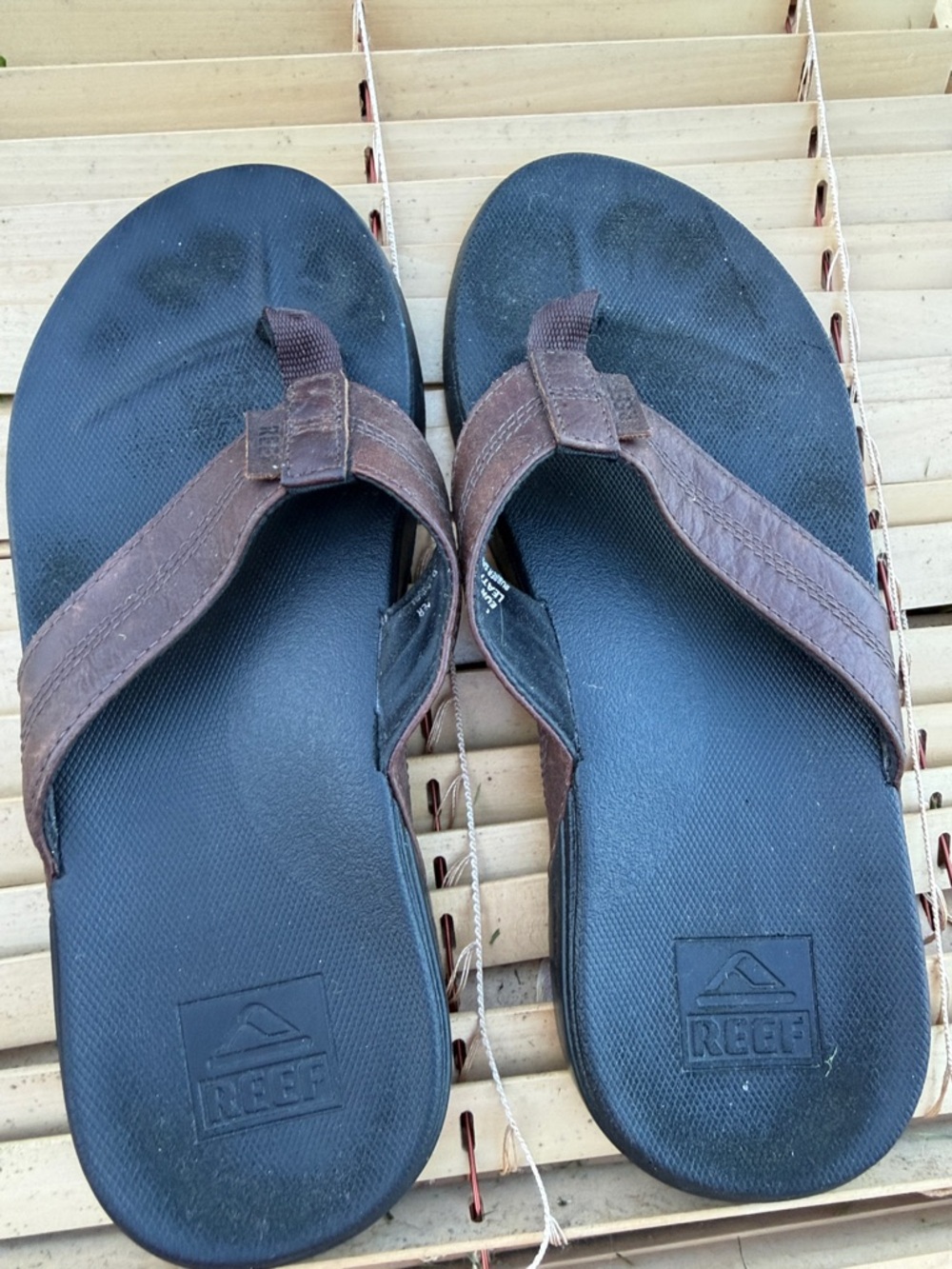 Reef Men’s Brown Strap Flip Flops with Black Footbed